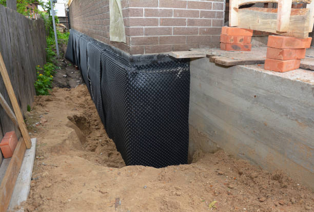 Happy homeowners after waterproofing job in Ripley
